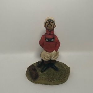 Dog looking up statue